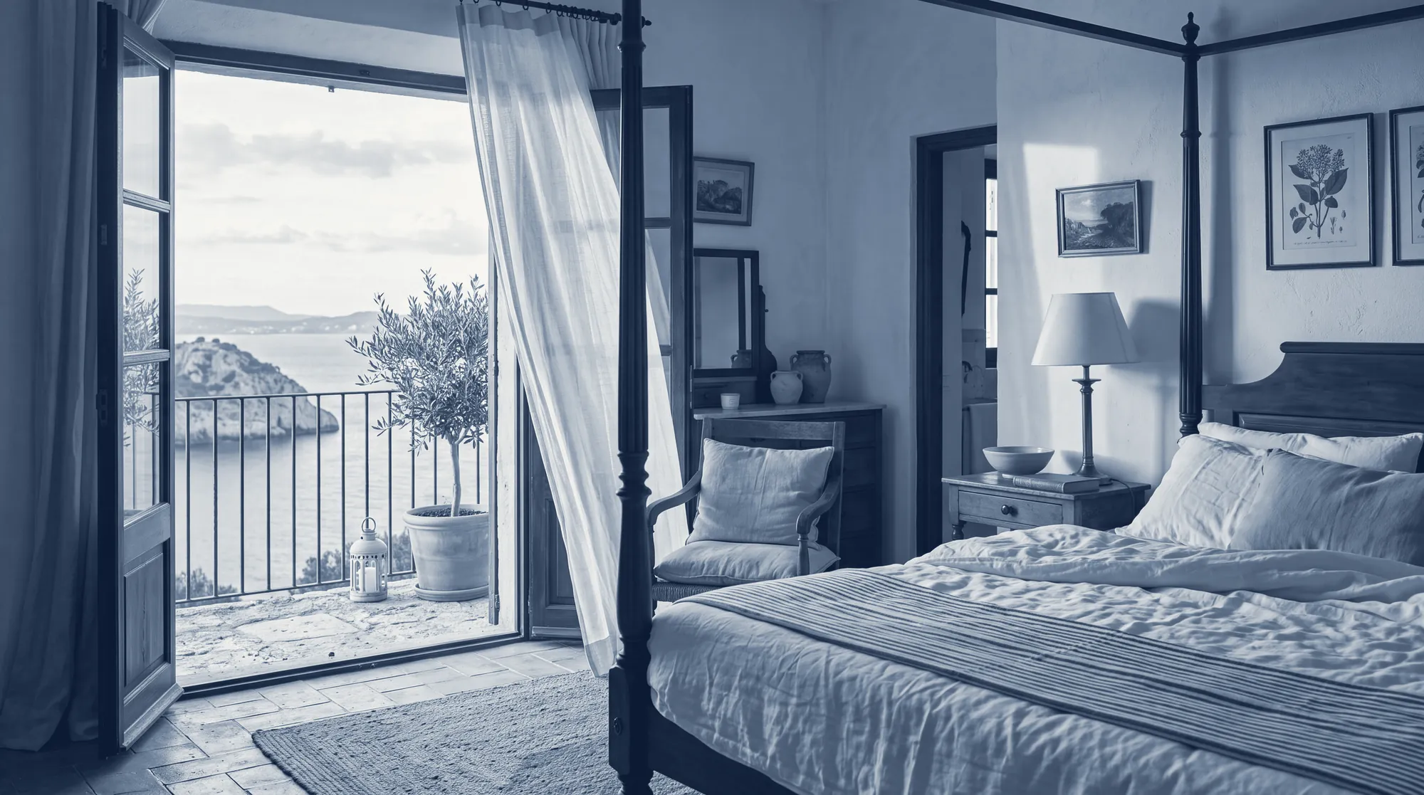 A warm private bedroom opening onto a Mediterranean sea view