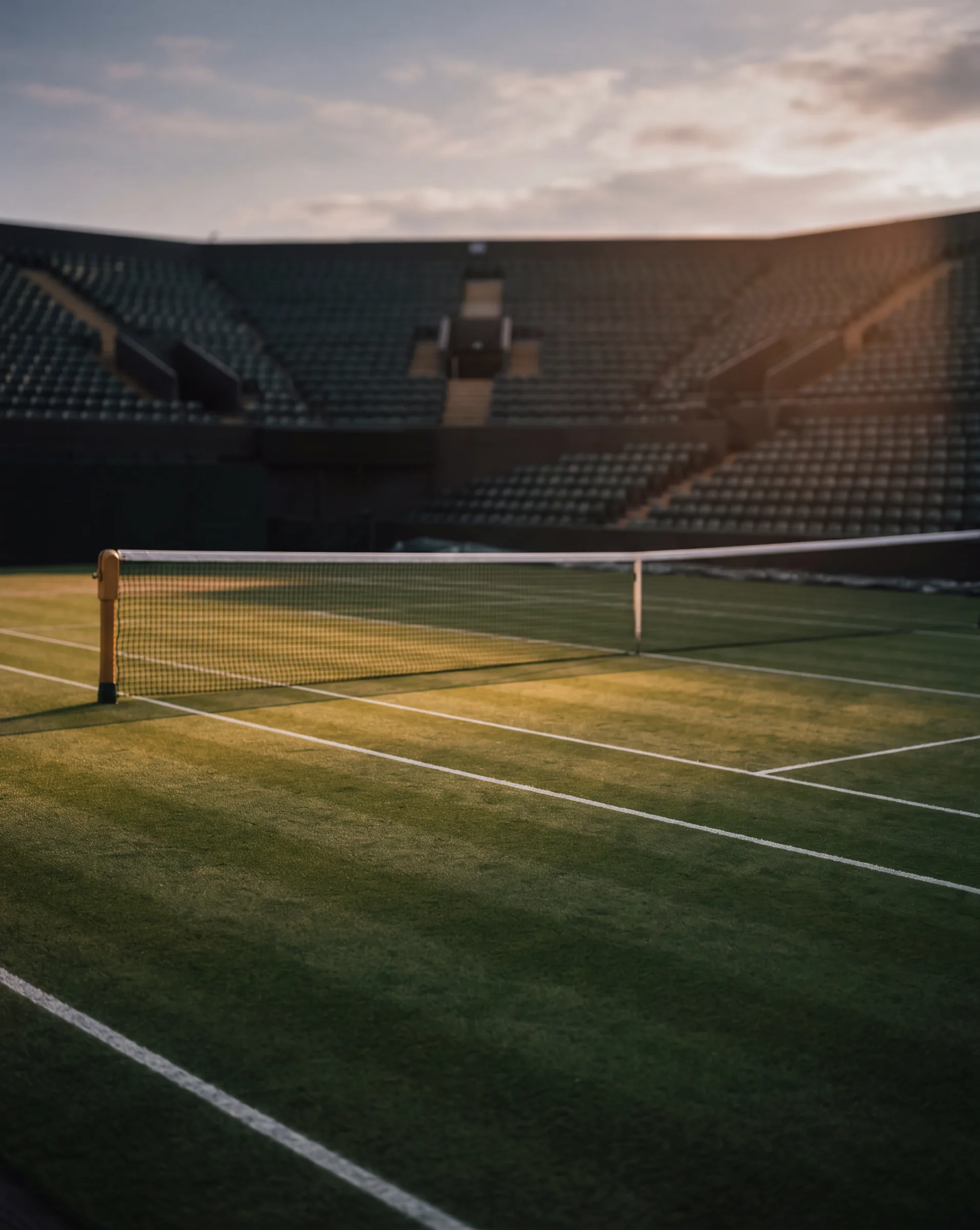 An empty centre court at dusk